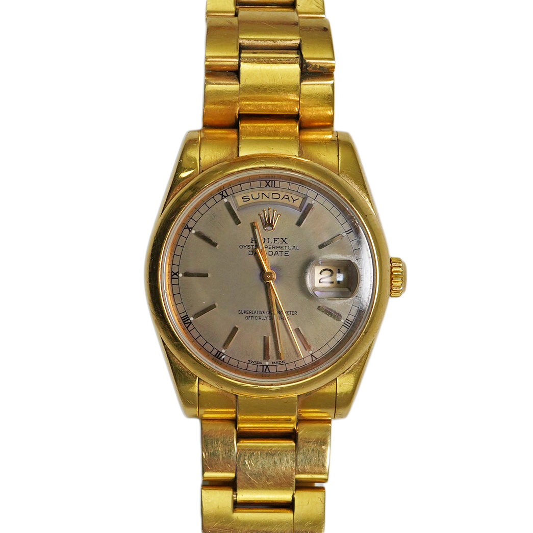 A gentleman's 2001 18ct gold Rolex Oyster Perpetual Day Date wrist watch, on an 18ct gold Rolex bracelet numbered 73858